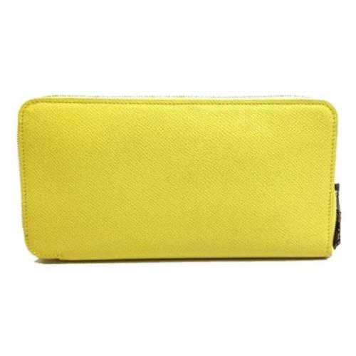 Pre-owned Leather wallets Hermès Vintage , Yellow , Dames