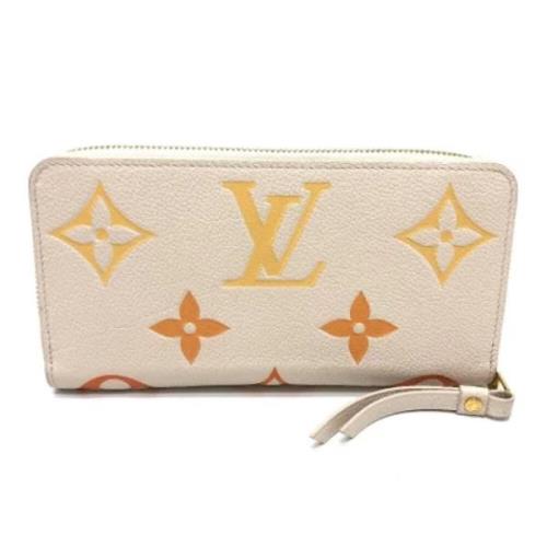 Pre-owned Fabric wallets Louis Vuitton Vintage , Beige , Dames