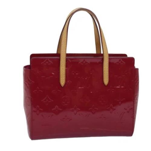 Pre-owned Leather handbags Louis Vuitton Vintage , Red , Dames