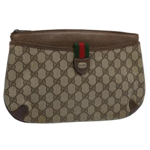 Pre-owned Canvas clutches Gucci Vintage , Beige , Dames