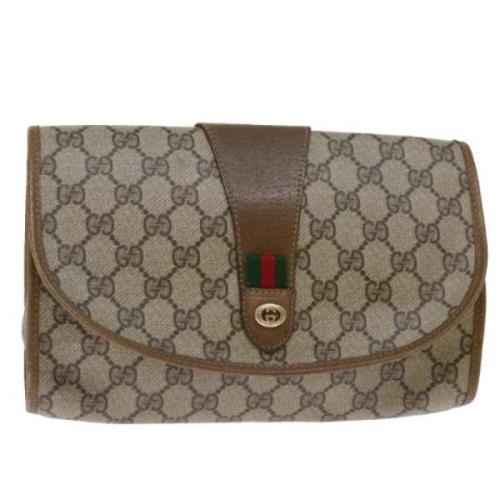 Pre-owned Leather clutches Gucci Vintage , Beige , Dames