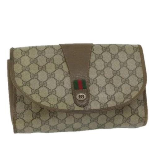 Pre-owned Leather clutches Gucci Vintage , Beige , Dames