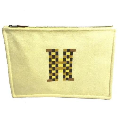 Pre-owned Fabric pouches Hermès Vintage , Yellow , Dames