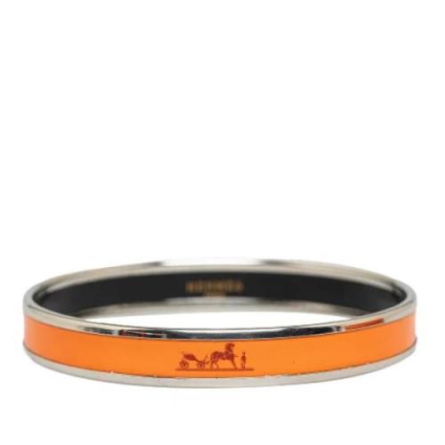 Pre-owned Metal bracelets Hermès Vintage , Orange , Dames