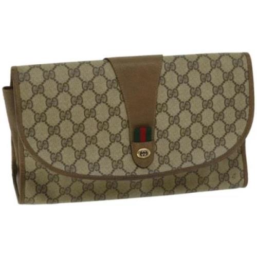 Pre-owned Leather clutches Gucci Vintage , Beige , Dames