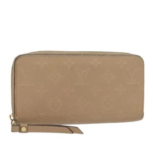 Pre-owned Leather wallets Louis Vuitton Vintage , Beige , Dames