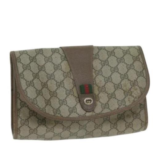 Pre-owned Leather clutches Gucci Vintage , Beige , Dames