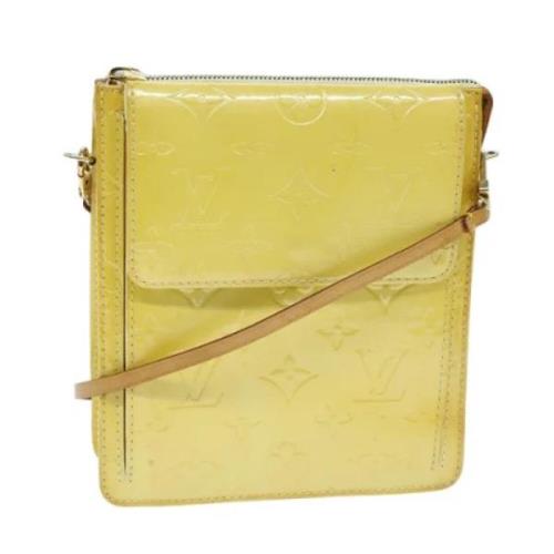 Pre-owned Leather pouches Louis Vuitton Vintage , Yellow , Dames