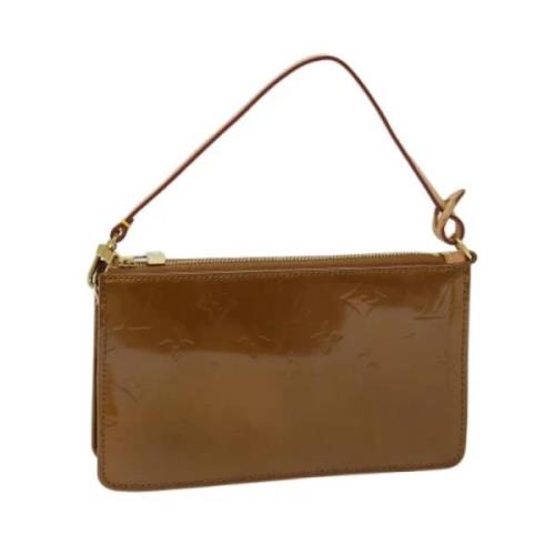 Pre-owned Leather clutches Louis Vuitton Vintage , Brown , Dames