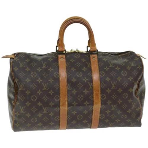 Pre-owned Canvas travel-bags Louis Vuitton Vintage , Brown , Dames