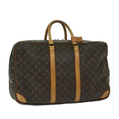 Pre-owned Canvas travel-bags Louis Vuitton Vintage , Brown , Dames