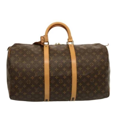 Pre-owned Canvas travel-bags Louis Vuitton Vintage , Brown , Dames