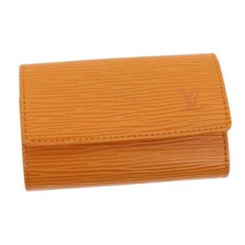 Pre-owned Leather key-holders Louis Vuitton Vintage , Orange , Dames