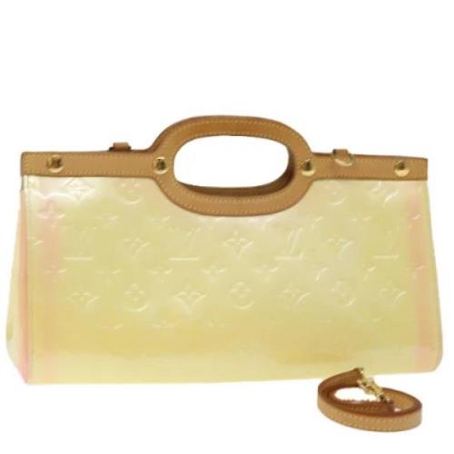 Pre-owned Leather handbags Louis Vuitton Vintage , Beige , Dames