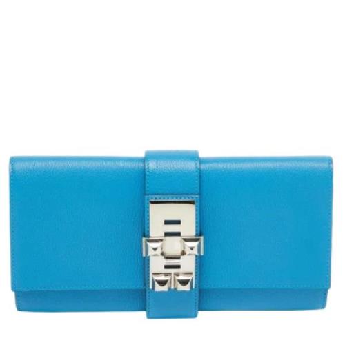 Pre-owned Leather clutches Hermès Vintage , Blue , Dames