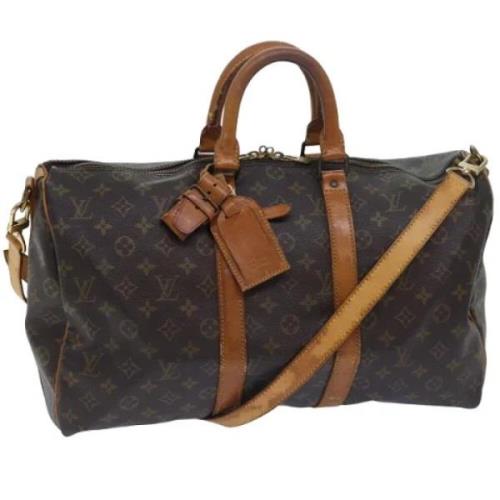 Pre-owned Canvas travel-bags Louis Vuitton Vintage , Brown , Dames