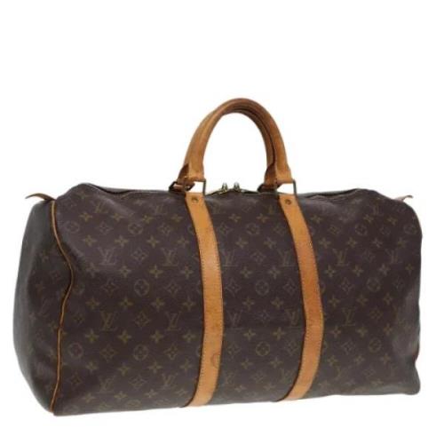 Pre-owned Canvas travel-bags Louis Vuitton Vintage , Brown , Dames