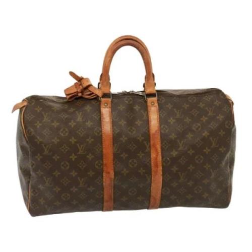 Pre-owned Canvas travel-bags Louis Vuitton Vintage , Brown , Dames