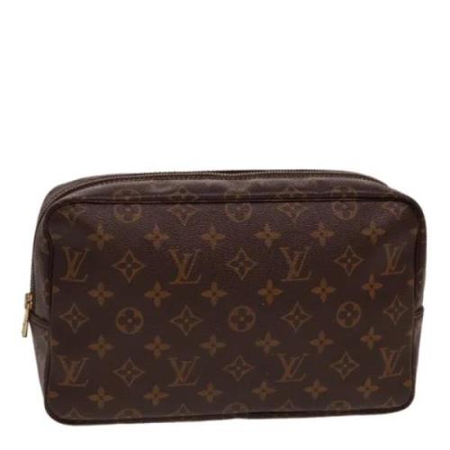 Pre-owned Canvas clutches Louis Vuitton Vintage , Brown , Dames