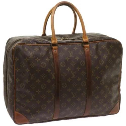 Pre-owned Canvas travel-bags Louis Vuitton Vintage , Brown , Dames