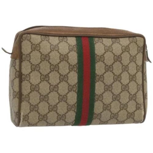 Pre-owned Leather clutches Gucci Vintage , Beige , Dames