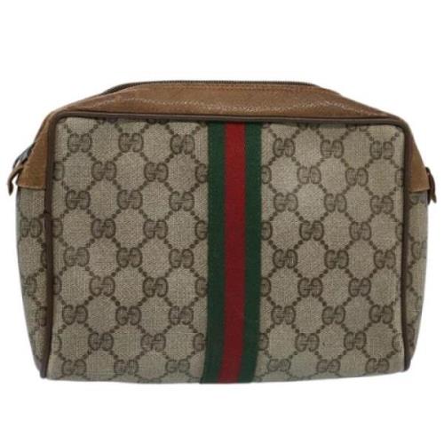 Pre-owned Canvas clutches Gucci Vintage , Beige , Dames