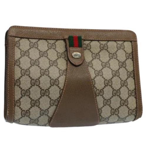 Pre-owned Leather clutches Gucci Vintage , Beige , Dames