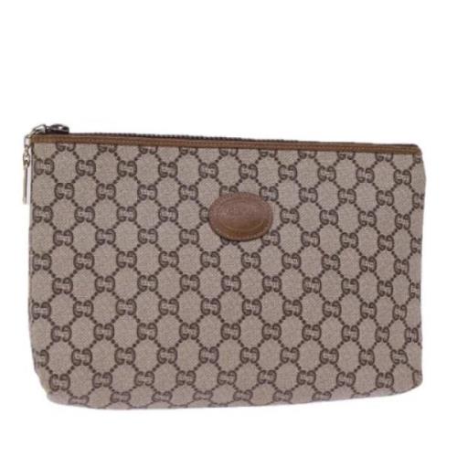 Pre-owned Leather clutches Gucci Vintage , Beige , Dames