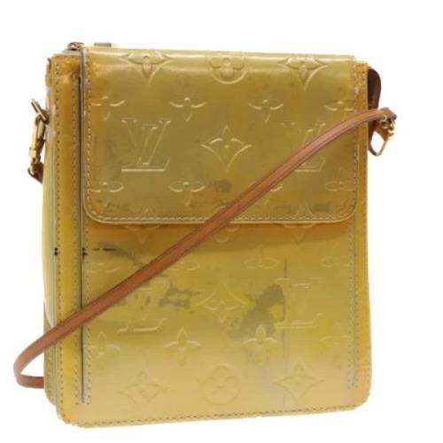 Pre-owned Leather pouches Louis Vuitton Vintage , Green , Dames