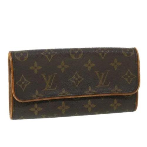 Pre-owned Canvas clutches Louis Vuitton Vintage , Brown , Dames