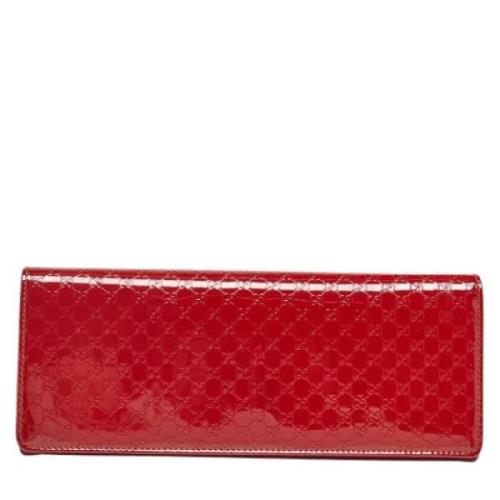 Pre-owned Leather clutches Gucci Vintage , Red , Dames