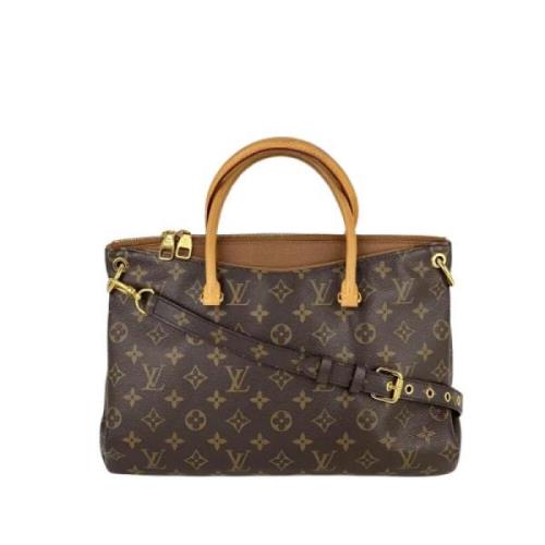 Pre-owned Canvas handbags Louis Vuitton Vintage , Brown , Dames