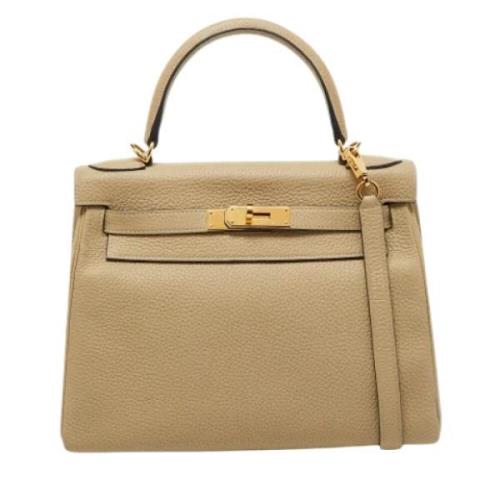 Pre-owned Leather handbags Hermès Vintage , Beige , Dames