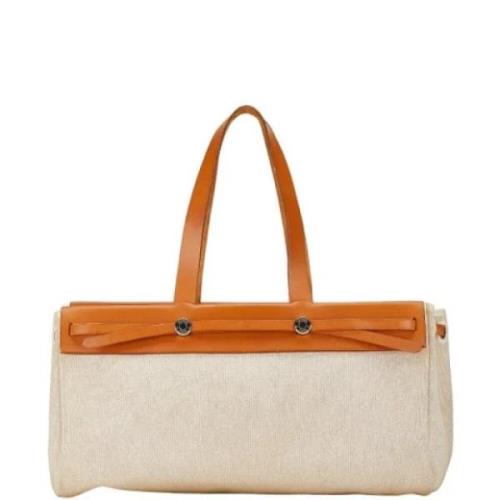 Pre-owned Leather handbags Hermès Vintage , Beige , Dames