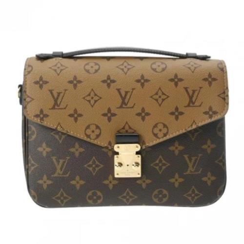 Pre-owned Canvas clutches Louis Vuitton Vintage , Brown , Dames