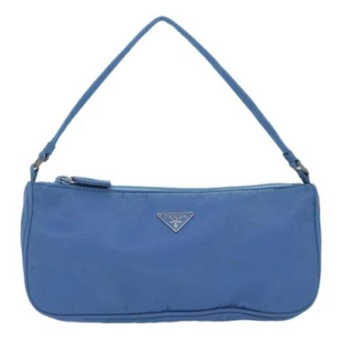 Pre-owned Fabric clutches Prada Vintage , Blue , Dames