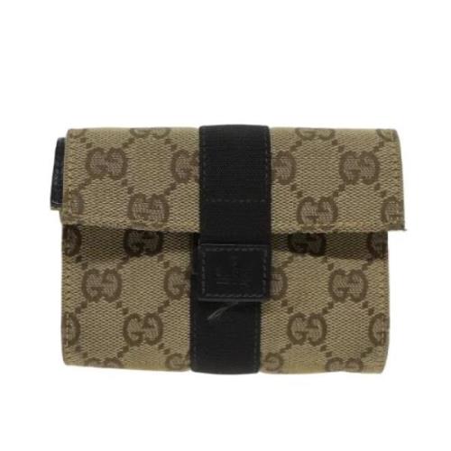 Pre-owned Canvas clutches Gucci Vintage , Beige , Dames