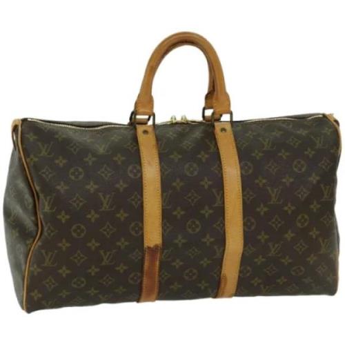 Pre-owned Canvas handbags Louis Vuitton Vintage , Brown , Dames