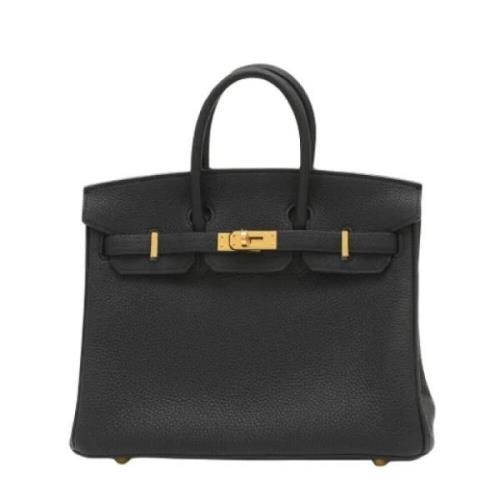 Pre-owned Leather handbags Hermès Vintage , Black , Dames