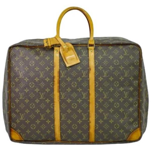 Pre-owned Canvas travel-bags Louis Vuitton Vintage , Brown , Dames