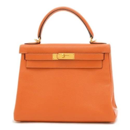 Pre-owned Leather handbags Hermès Vintage , Orange , Dames