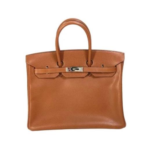 Pre-owned Leather handbags Hermès Vintage , Brown , Dames