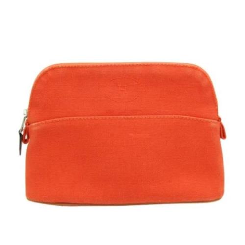 Pre-owned Cotton pouches Hermès Vintage , Orange , Dames