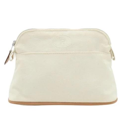 Pre-owned Canvas clutches Hermès Vintage , Beige , Dames