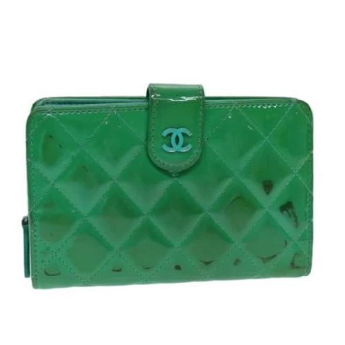 Pre-owned Coated canvas wallets Chanel Vintage , Green , Dames