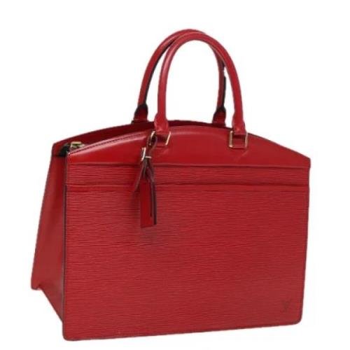 Pre-owned Leather handbags Louis Vuitton Vintage , Red , Dames