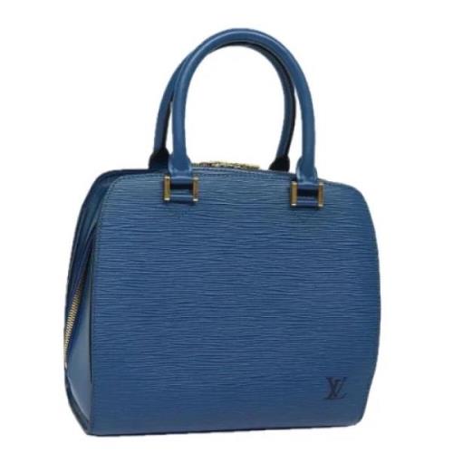 Pre-owned Leather handbags Louis Vuitton Vintage , Blue , Dames