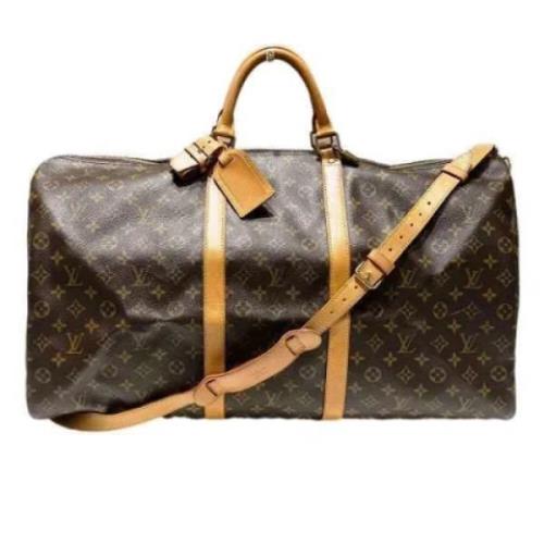 Pre-owned Canvas travel-bags Louis Vuitton Vintage , Brown , Dames