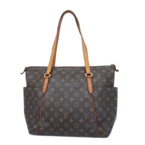 Pre-owned Fabric shoulder-bags Louis Vuitton Vintage , Brown , Dames