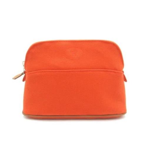 Pre-owned Canvas pouches Hermès Vintage , Orange , Dames